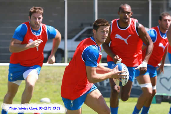 photo d'équipe de rugby durant un exercice d'entraînement